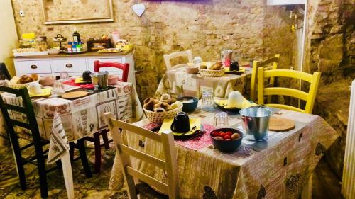 a kitchen with a table with food on it at Barbara’s rooms in Chioggia
