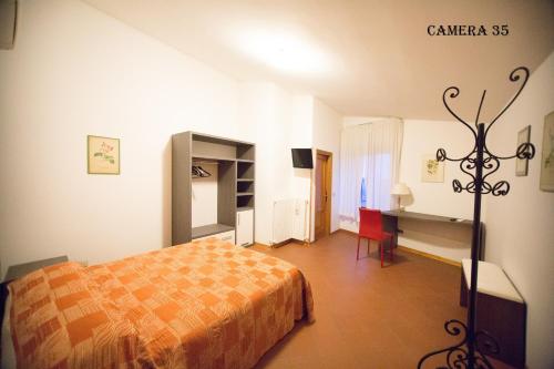 Posteľ alebo postele v izbe v ubytovaní Hotel I Tigli albergo diffuso