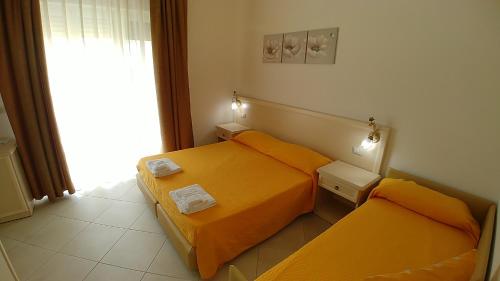 Llit o llits en una habitació de Afrodite