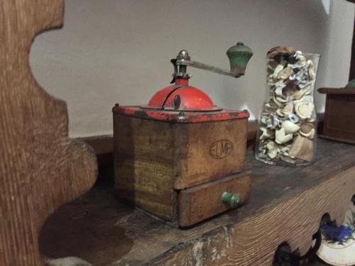 a toy chest with a red top on a table at Casa Camino Real in Puerto de Béjar