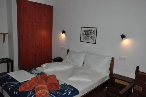 Postel nebo postele na pokoji v ubytování Hotel Hagiati