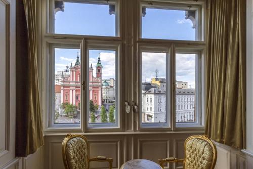 a window with a view of a city at Filip’s Palace Luxurious Apartment in Ljubljana