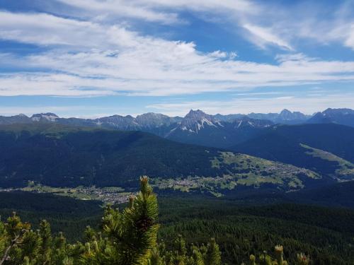 a view of a valley with mountains in the distance at La Suite in Candide