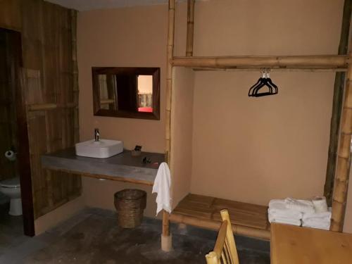 Vannas istaba naktsmītnē Eco Hotel Casa Kima