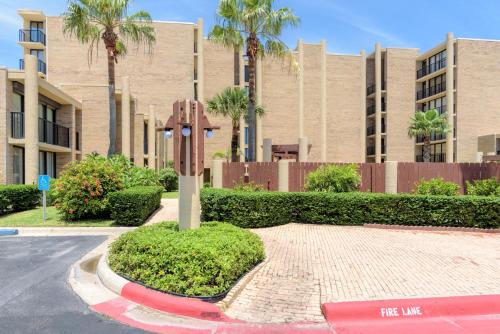 a sign in the middle of a street in front of a building at Sea Vista in South Padre Island