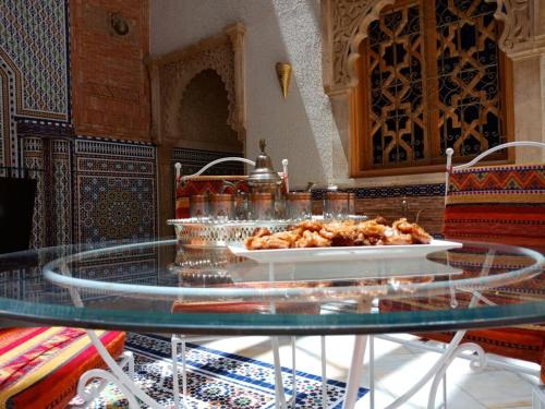 a table that has some food on it at Dar Rehab in Rabat