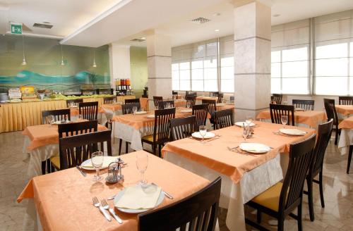 Restorāns vai citas vietas, kur ieturēt maltīti, naktsmītnē Hotel Colombo