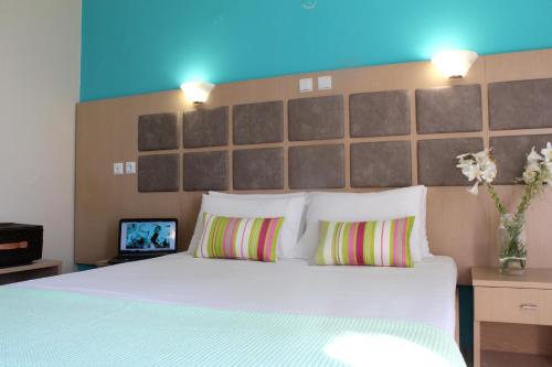 Postel nebo postele na pokoji v ubytování Thassos Hotel