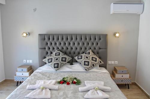 En eller flere senger på et rom på Astrakeroula Corfu
