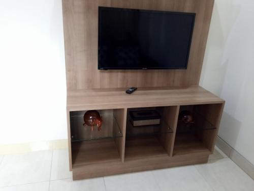 TV a/nebo společenská místnost v ubytování Karana House