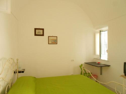 Postel nebo postele na pokoji v ubytování B&B Il Patio