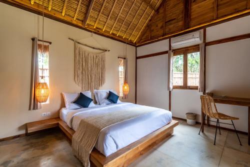 Postel nebo postele na pokoji v ubytování Green Escape Eco Resort