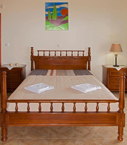 Ένα ή περισσότερα κρεβάτια σε δωμάτιο στο Ellinas Homes