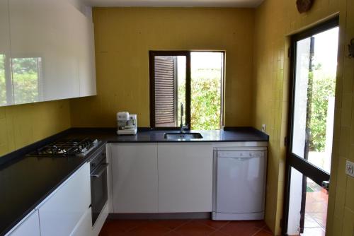 Moradia com piscina em Cabanas