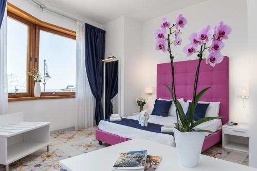 Ένα ή περισσότερα κρεβάτια σε δωμάτιο στο Hotel Sole Splendid