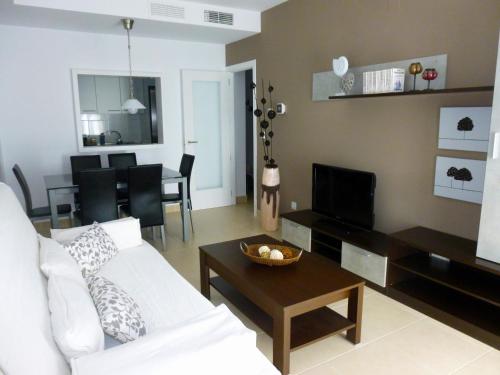 Posezení v ubytování Apartamento con piscina
