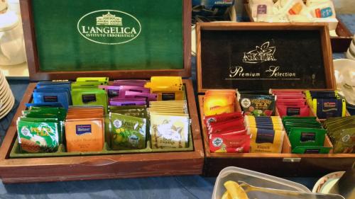 two wooden boxes filled with different types of food at Hotel Cristallo in Lerici