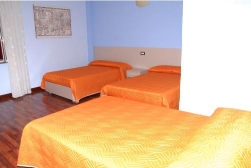 Katil atau katil-katil dalam bilik di Residence Jano