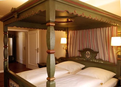 Ένα ή περισσότερα κρεβάτια σε δωμάτιο στο Hotel Reichsküchenmeister
