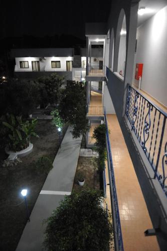 an empty hallway of a building at night at Maritime in Kremasti