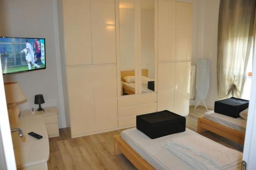 Voodi või voodid majutusasutuse Milano Easy toas