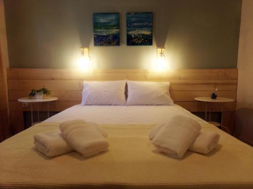Postel nebo postele na pokoji v ubytování Leia Guest House