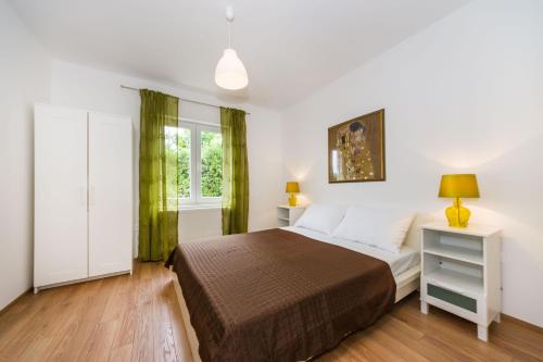 Postel nebo postele na pokoji v ubytování Apartment Alex
