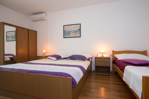 Säng eller sängar i ett rum på Guesthouse Nihada