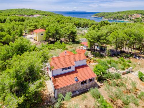 an aerial view of a house with an orange roof at Apartment Rusula in Milna