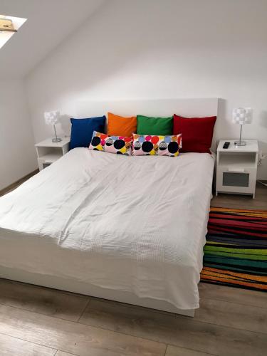 Postel nebo postele na pokoji v ubytování Green Garden Plus Apartman