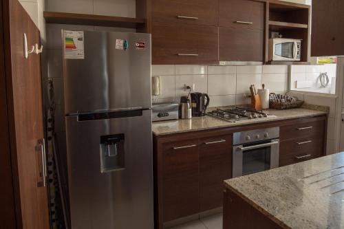 Kjøkken eller kjøkkenkrok på Departamento Viña Del Mar 4 Norte