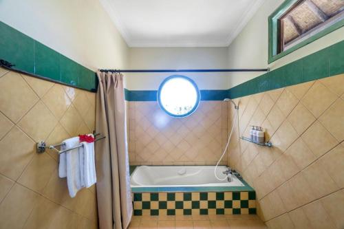 Ванна кімната в Metteyya Healing House