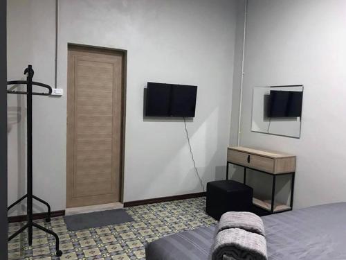 Televízia a/alebo spoločenská miestnosť v ubytovaní Chato Hostel