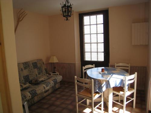 Χώρος καθιστικού στο Appartement La Bananeraie
