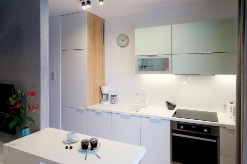 Kuchyňa alebo kuchynka v ubytovaní Mojito Apartments - Botanica II