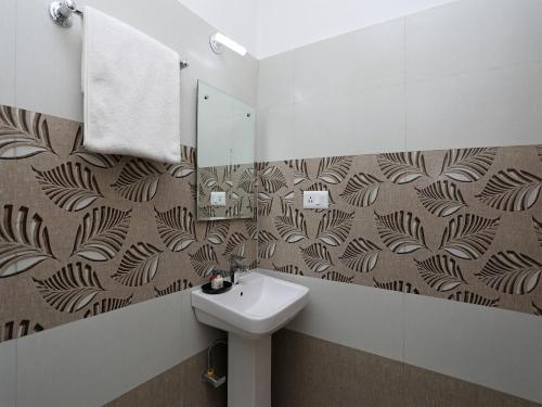 Ett badrum på Hotel KSS Inn