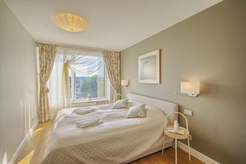 Postel nebo postele na pokoji v ubytování Penthouse