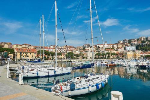 a group of boats docked in a marina at Hotel Croce Di Malta in Imperia