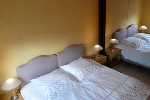 Cama o camas de una habitación en Gîte des Collines d'Artois
