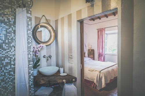 Ванна кімната в Villa Unica Sant'Alberto