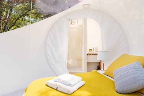 Tempat tidur dalam kamar di Somn'en Bulle