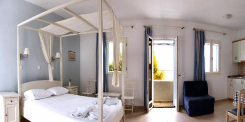 Кровать или кровати в номере Dream Island Hotel