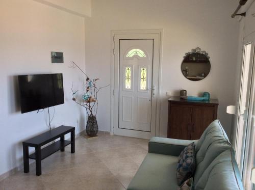TV a/nebo společenská místnost v ubytování S&S Pura Vida Apartment