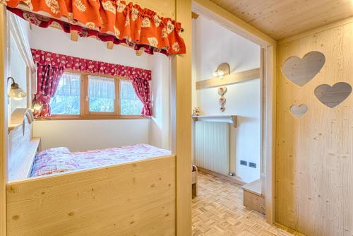 Postel nebo postele na pokoji v ubytování Residence Ronchi