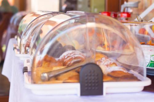 a container of pastries on a table at Biancolivo Gallipoli in Salento in Gallipoli