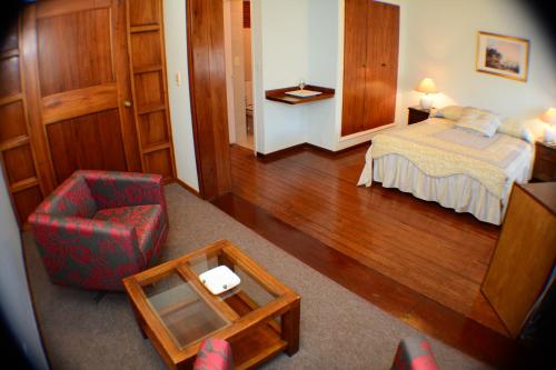 Postel nebo postele na pokoji v ubytování Hotel Crown