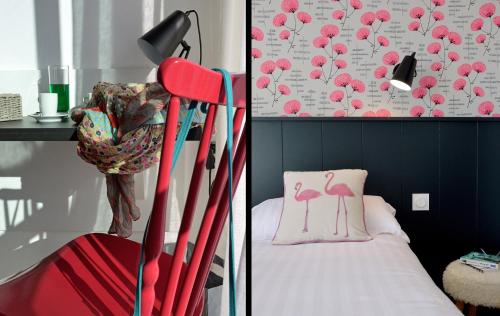 a red chair with a pink flamingo pillow and a lamp at Logis Hotel Du Port in Plobannalec-Lesconil