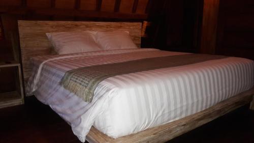 Кровать или кровати в номере Telagamas Guest House