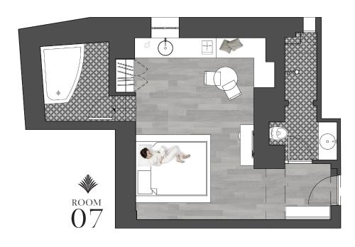 a floor plan of a room with a woman laying down at The Anthemion House in Kavala