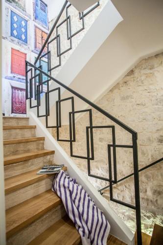 a set of stairs with a pair of shoes on them at Villa Lucia in Trogir